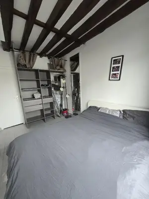 Un ou plusieurs lits dans un hébergement de l'établissement Cosy 1-bedroom apartment - Paris 17