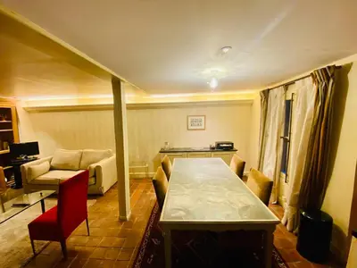 Un ou plusieurs lits dans un hébergement de l'établissement Appartement Musée du Louvre Paris