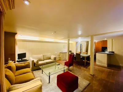 Télévision ou salle de divertissement dans l'établissement Appartement Musée du Louvre Paris