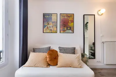 Un ou plusieurs lits dans un hébergement de l'établissement Cozy Studio - Eiffel Tower - Sleeps 2P