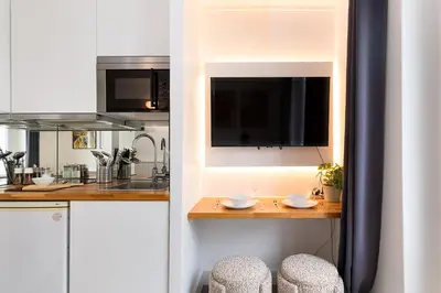 Cuisine ou kitchenette dans l'établissement Cozy Studio - Eiffel Tower - Sleeps 2P