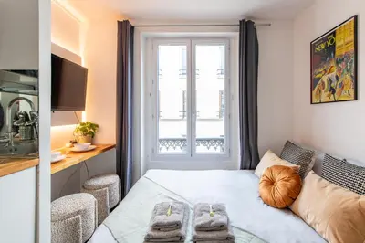 Un ou plusieurs lits dans un hébergement de l'établissement Cozy Studio - Eiffel Tower - Sleeps 2P