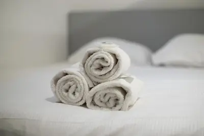 Un ou plusieurs lits dans un hébergement de l'établissement Majestic Suites - Paris 11