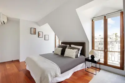 Un ou plusieurs lits dans un hébergement de l'établissement Prestige Avenue Kléber