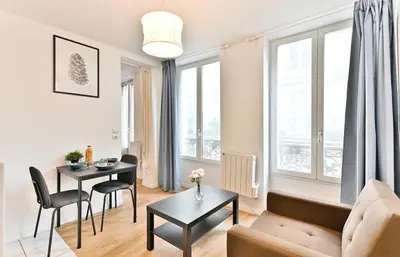 Coin salon dans l'établissement Apartment near Mairie Paris 10ème - III