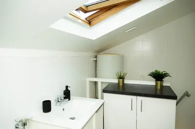 Cuisine ou kitchenette dans l'établissement Studio Stade de France 26 pour 2 personnes