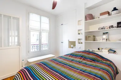 Un ou plusieurs lits dans un hébergement de l'établissement GuestReady - Parisian style home by la Bastille