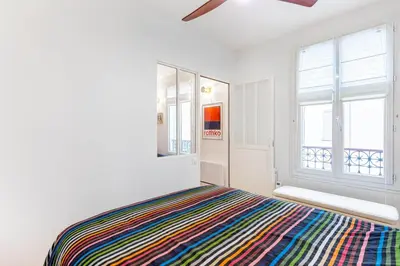 Un ou plusieurs lits dans un hébergement de l'établissement GuestReady - Parisian style home by la Bastille