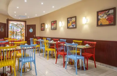 Restaurant ou autre lieu de restauration dans l'établissement Hotel Terminus Montparnasse