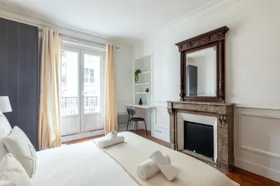 Un ou plusieurs lits dans un hébergement de l'établissement Appartement Prestige dans le 16ᵉ