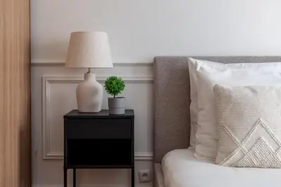 Un ou plusieurs lits dans un hébergement de l'établissement Appartement Prestige dans le 16ᵉ