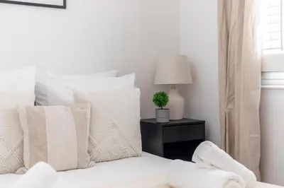 Un ou plusieurs lits dans un hébergement de l'établissement Appartement Prestige dans le 16ᵉ
