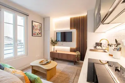 Un ou plusieurs lits dans un hébergement de l'établissement Stunning Tiny Studio - 5 min to Eiffel Tower