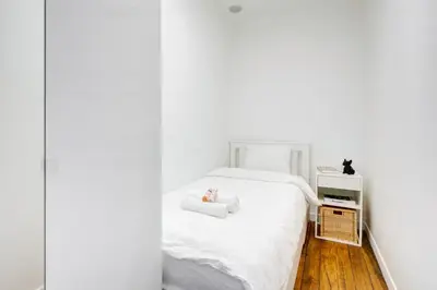 Un ou plusieurs lits dans un hébergement de l'établissement Stylish Luxury Suite - Hyper Centre Paris