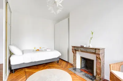 Un ou plusieurs lits dans un hébergement de l'établissement Stylish Luxury Suite - Hyper Centre Paris