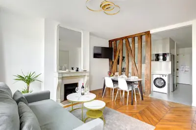 Cuisine ou kitchenette dans l'établissement Stylish Luxury Suite - Hyper Centre Paris