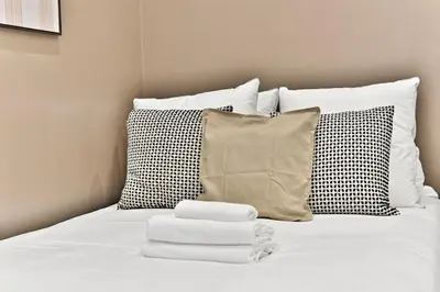 Un ou plusieurs lits dans un hébergement de l'établissement Central equipped apartment Paris Nation - II