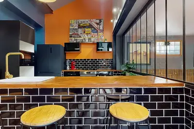 Cuisine ou kitchenette dans l'établissement Loft Unique au Design Contemporain