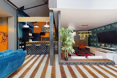 Coin salon dans l'établissement Loft Unique au Design Contemporain