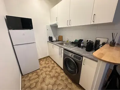 Cuisine ou kitchenette dans l'établissement appartement Paris 8