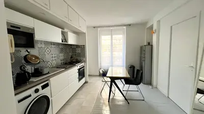 Cuisine ou kitchenette dans l'établissement cosy design apartment Paris