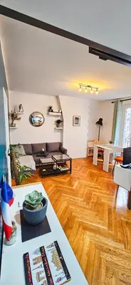 Coin salon dans l'établissement Lovely flat Abbesses center - Paris Montmartre