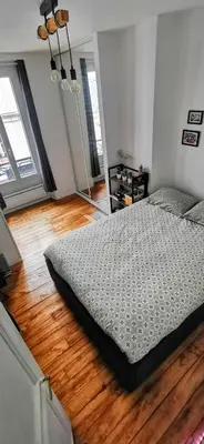 Un ou plusieurs lits dans un hébergement de l'établissement Lovely flat Abbesses center - Paris Montmartre