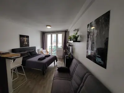 Coin salon dans l'établissement Apartment Louvre