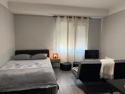 Un ou plusieurs lits dans un hébergement de l'établissement Apartment Cachan