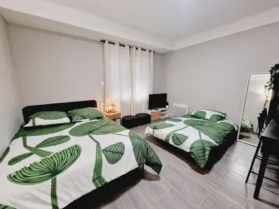 Un ou plusieurs lits dans un hébergement de l'établissement Apartment Cachan