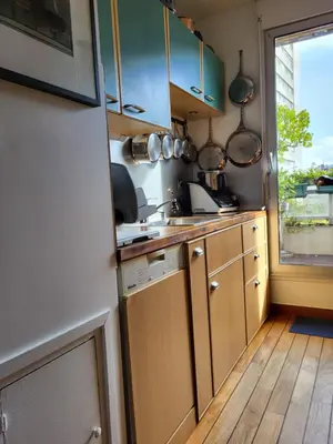 Cuisine ou kitchenette dans l'établissement Appartement de Charme avec terrasse proche 5eme arrdt