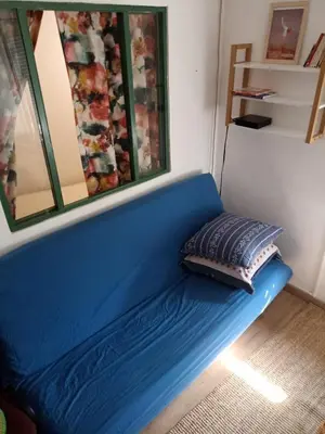 Coin salon dans l'établissement T2 -Cosy and Comfort in Paris - Montmartre