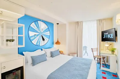 Un ou plusieurs lits dans un hébergement de l'établissement Hotel Joke - Astotel