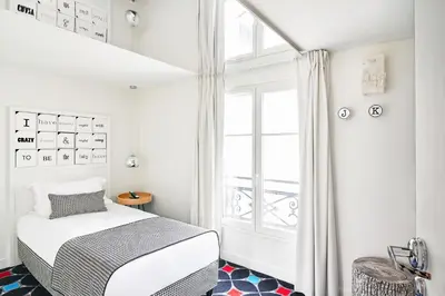 Un ou plusieurs lits dans un hébergement de l'établissement Hotel Joke - Astotel