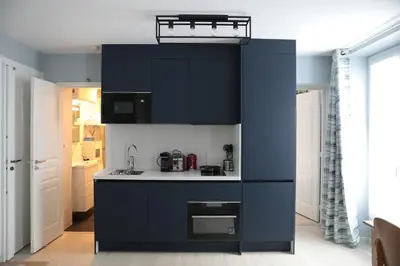 Cuisine ou kitchenette dans l'établissement Appartement élégant - Montmartre