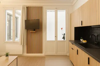 Cuisine ou kitchenette dans l'établissement Charming getaway in Le MARAIS - OBERKAMPF working & living