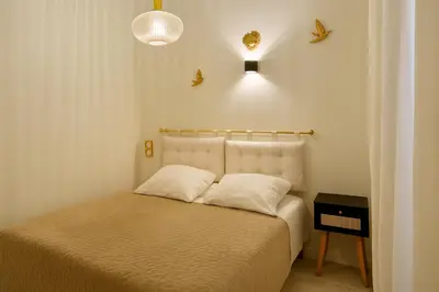 Un ou plusieurs lits dans un hébergement de l'établissement Charming getaway in Le MARAIS - OBERKAMPF working & living
