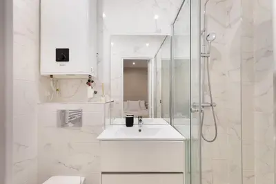 Salle de bains dans l'établissement Lasuite Montbrun