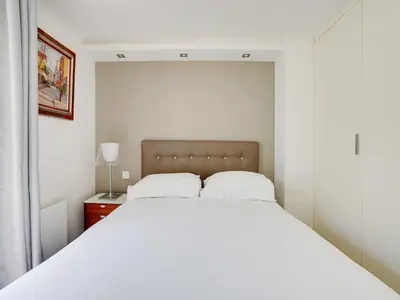 Un ou plusieurs lits dans un hébergement de l'établissement Cosy apt - 1BD 2P - Notre-Dame Cathedral Paris