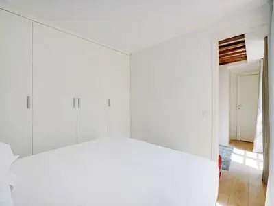 Un ou plusieurs lits dans un hébergement de l'établissement Cosy apt - 1BD 2P - Notre-Dame Cathedral Paris