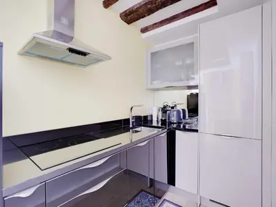 Cuisine ou kitchenette dans l'établissement Cosy apt - 1BD 2P - Notre-Dame Cathedral Paris