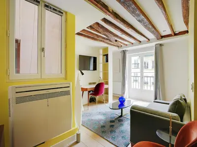 Coin salon dans l'établissement Cosy apt - 1BD 2P - Notre-Dame Cathedral Paris