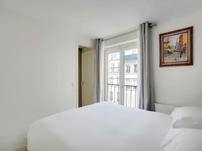 Un ou plusieurs lits dans un hébergement de l'établissement Cosy apt - 1BD 2P - Notre-Dame Cathedral Paris