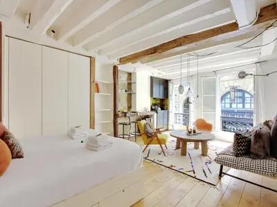 Un ou plusieurs lits dans un hébergement de l'établissement Cosy studio 2 pers ST GERMAIN DES PRES ODEON -