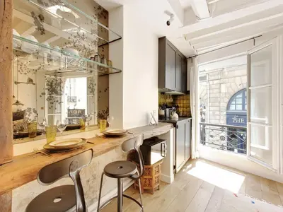 Coin salon dans l'établissement Cosy studio 2 pers ST GERMAIN DES PRES ODEON -