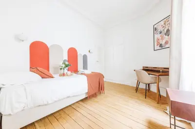 Un ou plusieurs lits dans un hébergement de l'établissement Exceptional apartment near the Eiffel Tower 3 BDR 5 P