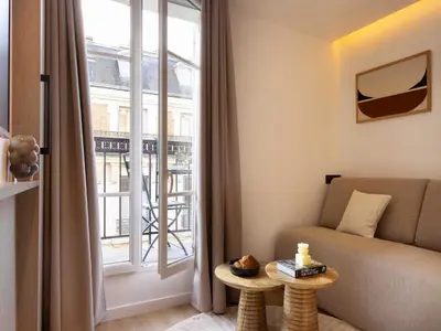 Coin salon dans l'établissement Refined studio with balcony - 2P - Saint Lazare