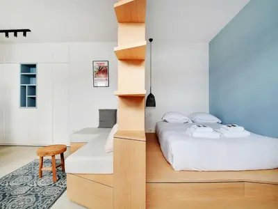Un ou plusieurs lits dans un hébergement de l'établissement Cosy and intimate Studio - 1BD 2P - Oberkampf
