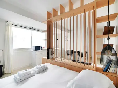 Un ou plusieurs lits dans un hébergement de l'établissement Cosy and intimate Studio - 1BD 2P - Oberkampf