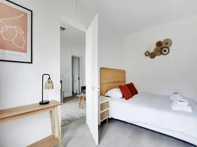 Un ou plusieurs lits dans un hébergement de l'établissement Charming flat - 1BDR 2P Rue Saint Maur